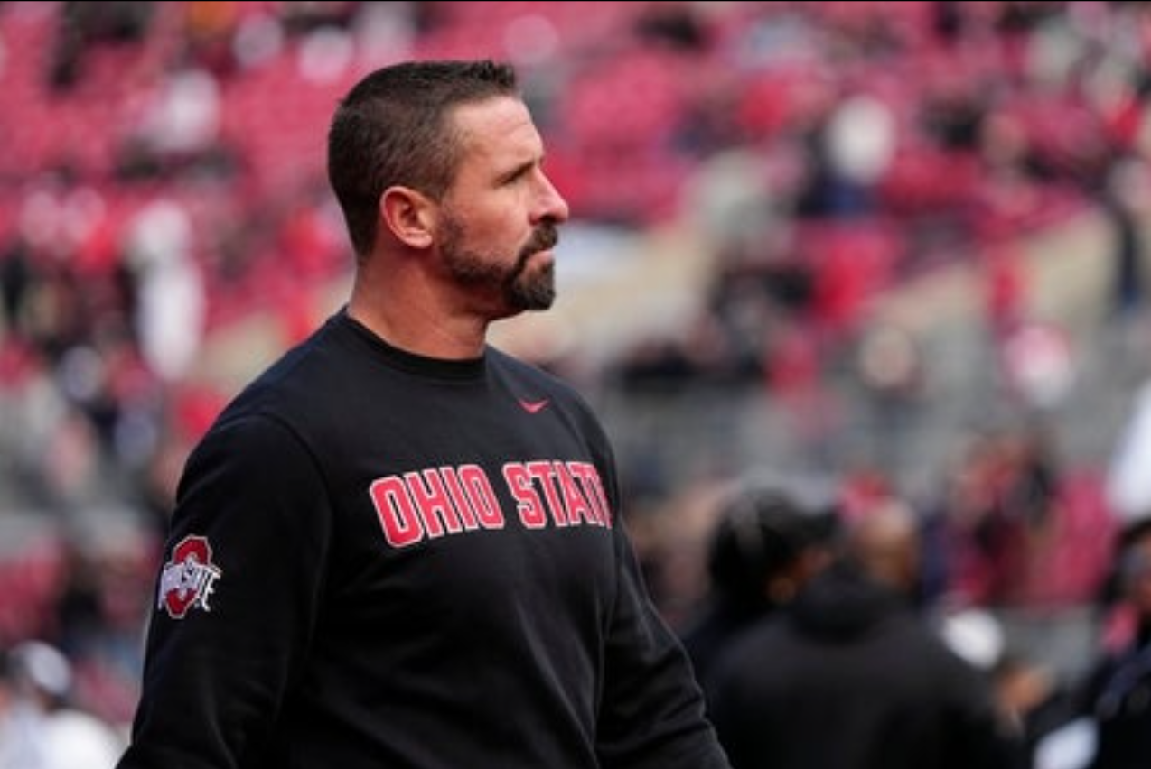 Ohio State Buckeyes offensive coordinator Brian Hartline leads warm ups prior to the NCAA football game against the Penn State Nittany Lions at Ohio Stadium in Columbus on Nov. 1, 2025.